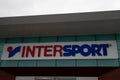 Intersport brand store text sign retail logo sporty facade of french chain of Sports