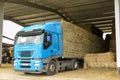 Bordeaux , Aquitaine / France - 04 16 2020 : iveco stralis 480 heavy trailer truck transporting straw bales in the farmyard Royalty Free Stock Photo