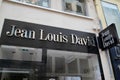 Jean Louis David hairdresser salon sign expert barber shop brand text