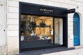 Jo Malone London sign text and brand logo front of boutique uk fashion store and