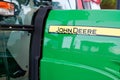 John Deere Tractor Trademark brand text and Logo sign on green side