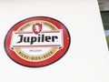 Jupiler logo brand and text sign of beer front wall of pub bar restaurant of Belgian