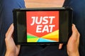 Bordeaux , Aquitaine / France - 03 03 2020 : just Eat sign logo tablet home application food delivery app