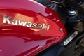 Kawasaki side logo sign and brand text motorcycle roadster bike red motorbike