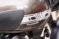 Kawasaki w 800 text brand of motorcycle classic sign logo on motorbike fuel tank Royalty Free Stock Photo