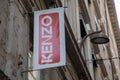 kenzo paris brand text facade store signage and logo sign on shop wall facade