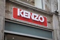 Kenzo sign text and logo brand wall facade entrance luxury fashion house by Japanese