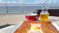 Kerisac red bowl of cider with locale typical french Breton crepe complete on