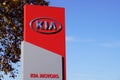 Kia logo sign and text front of store vehicle of korean car dealership shop Royalty Free Stock Photo