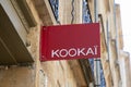 Kookai store logo text French brand fashion KookaÃÂ¯ clothing sign shop chain wall Royalty Free Stock Photo