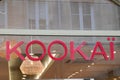 Kookai store logo text French clothes brand fashion KookaÃÂ¯ boutique facade sign shop