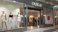 Kookai store text logo French clothing brand boutique fashion KookaÃ¯ windows sign