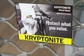 Kryptonite sign logo and brand text front of store bicycle lock lockup protection shop