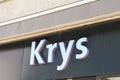 Krys logo and text sign front of optician shop optic glasses store