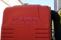 Kubota logo sign and brand text on Lawn Mower tractor and heavy equipment manufacturer