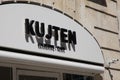 Kujten paris sign brand and logo text facade