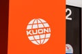 Kuoni globe logo and text sign of Travel agency tourism company founded in Zurich