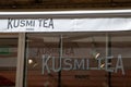 Kusmi Tea paris chain food logo sign and brand text store wall facade