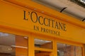 Bordeaux , Aquitaine / France - 07 22 2020 : l`occitane en provence shop brand logo and text sign on french yellow facade wall