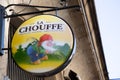 La Chouffe logo brand garden gnome cartoon and sign text on bar restaurant pub facade