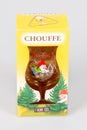 La Chouffe logo garden gnome cartoon and sign text on glass in advertising cardboard