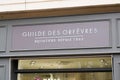 La guilde des orfevres logo brand and text sign front of store commercial shop