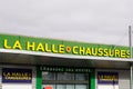 La halle aux chaussures shoes brand logo and sign text on facade entrance fashion