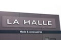 La halle mode et chaussures boutique brand logo and sign text on facade entrance