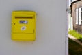 La Poste logo text and brand sign on yellow mail box post in France