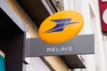 La poste relais france office store sign french post logo brand relay country shop on Royalty Free Stock Photo
