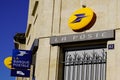 La poste sign and Banque postale text logo front of office french post agency bank