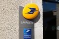 La poste text and la Banque postale store french post logo brand on shop sign wall