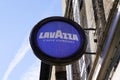 Lavazza logo brand and text sign of coffee shop advertising facade pub bar restaurant