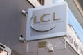 lcl golden logo and text sign front of building le credit Lyonnais Banque et