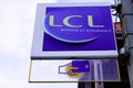 Lcl text and atm logo sign le credit Lyonnais french bank signage store office