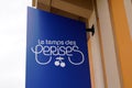 Le temps des cerises logo text and brand sign of south french clothing facade store in