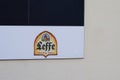 Leffe Belgian beer sign logo and brand text on bar restaurant facade