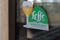 Leffe Belgian beer sign sticker with text logo on windows bar restaurant pub