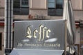 Leffe Belgian beer signbrewery text and wall brand logo on bar shop restaurant