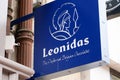 Leonidas logo brand and sign text facade shop of Belgian Chocolates famous store