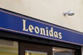 Leonidas logo brand and sign text facade shop entrance of Belgian Chocolates famous