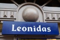 Leonidas logo brand and text sign front of facade Belgian Chocolates store of