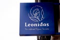 Leonidas logo sign of Belgian Chocolates shop brand text facade store confectionery