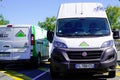 Leroy Merlin green delivery van and rent truck of decoration store chain with text