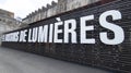 Les Bassins de LumiÃÂ¨res text sign of immersive temporary show