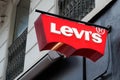 Levi`s brand logo and red sign text of shop fashion clothing levis store
