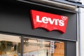 Levis logo brand front of clothing store shop sign Levi`s on building street