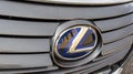 Lexus metal chrome blue logo brand and sign closeup on front hybrid car Royalty Free Stock Photo