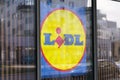 Lidl sign text and logo round brand of store front hard discount supermarket chain shop