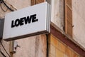 Loewe spanish logo brand store and sign facade text shop Luxury handbags and luggages